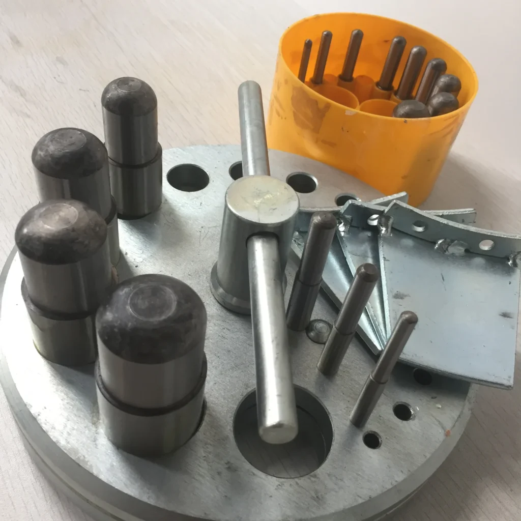 Gasket punch tool components